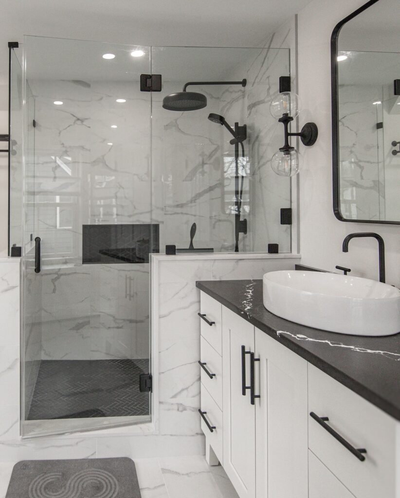 Bathroom Remodeling - River City Construction A stylish bathroom featuring two sinks and a large mirror, showcasing modern design by by river city construction Medford bathroom remodel expert team.